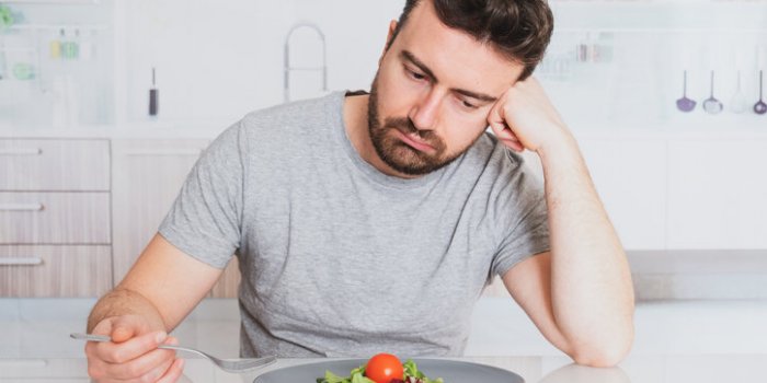 sad man diet ready to eat salad for weight loss