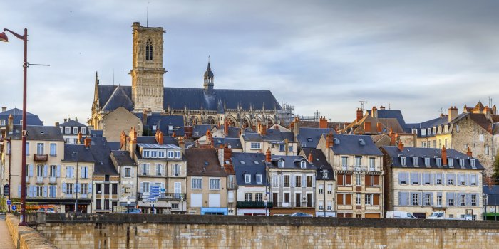 view of nevers from loire river bridge, france