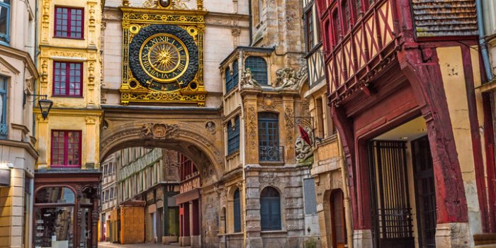 old cozy street in rouen with famos great clocks or gros horloge of rouen, normandy, france with nobody